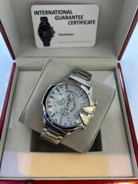 ساعت دیزل مردانه بنداستیل نقره ای صفحه سفید 369064