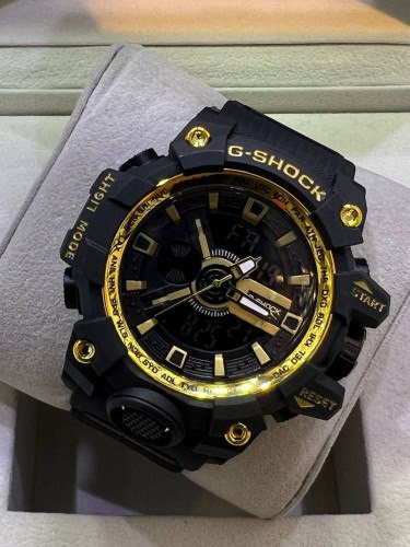 ساعت اسپرت جی شاک مردانه بندمشکی طلایی 369314