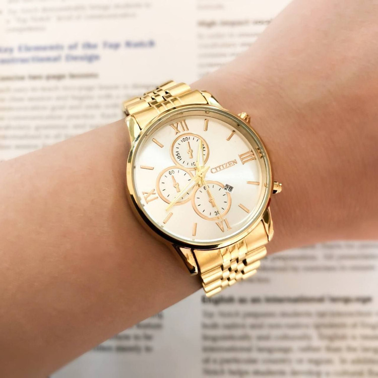 ساعت زنانه بنداستیل طلایی توپر همراه با دستبند کد 55018