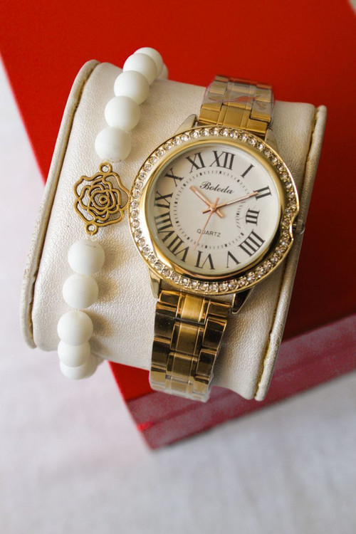 ساعت زنانه بنداستیل طلایی توپر همراه با دستبند کد 55018