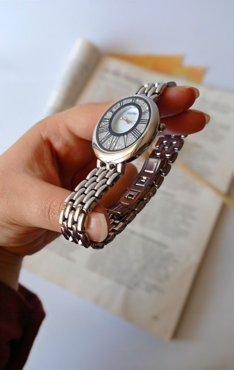 ساعت مچی زنانه بنداستیل نقره ای صفحه گرد مارک CK