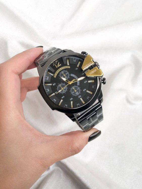 ساعت دیزل مردانه بنداستیل مشکی صفحه مشکی شاخ دار طلایی کد 369424