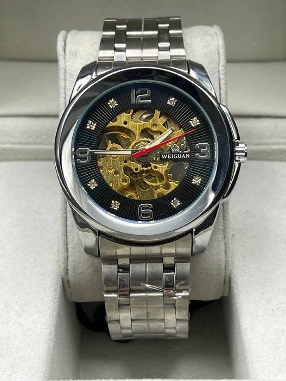 ساعت مردانه برند WELGUAN بند فلزی فول استیل نقره ای صفحه مشکی