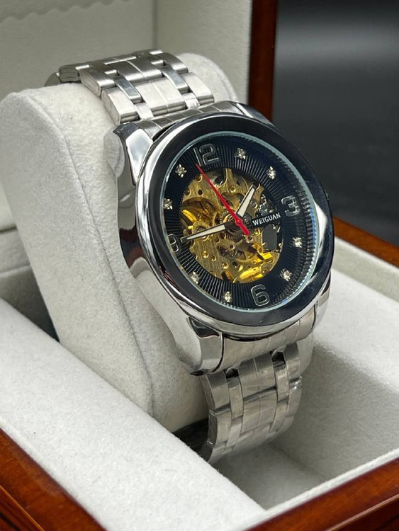 ساعت مردانه برند WELGUAN بند فلزی فول استیل نقره ای صفحه مشکی