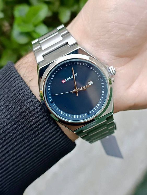 ساعت مچی مردانه صفحه بزرگ گرد بند نقره ای برند maimashi